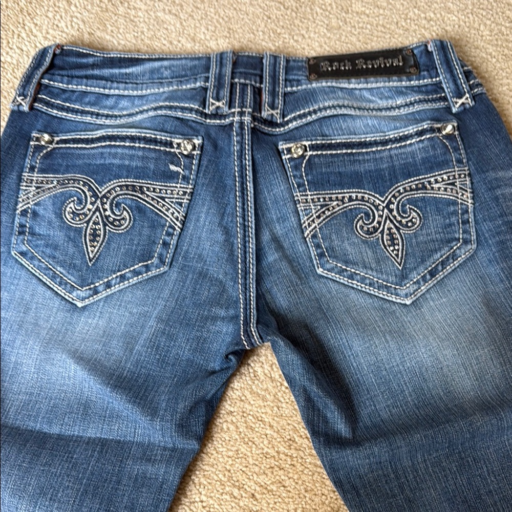 Rock Revival Blue Boot Cut Jeans with Ornate Stitching